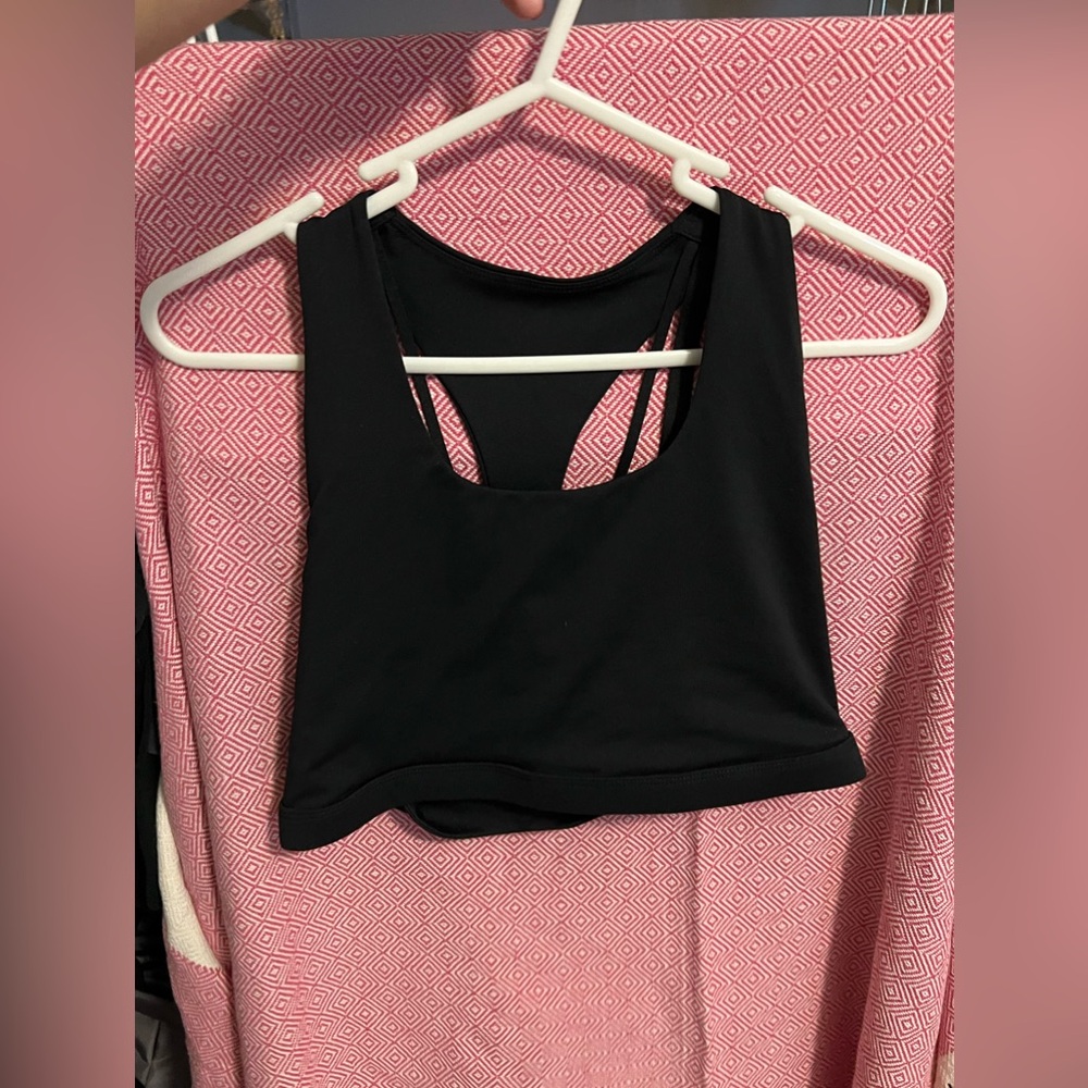 black strappy fabletics sports bra